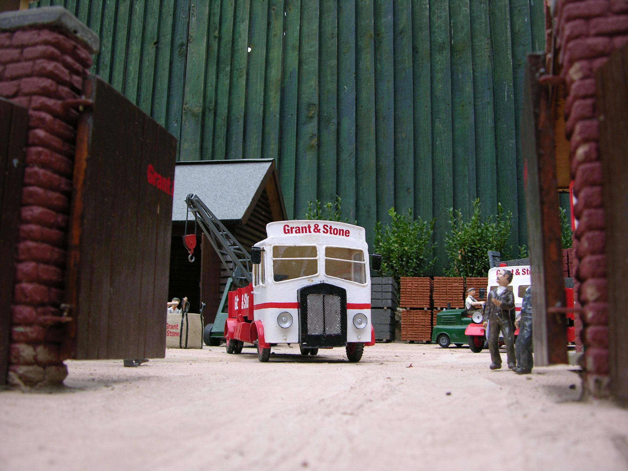 A model of a Grant & Stone depot in a model village.